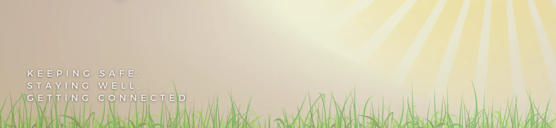 A field of grass with the words "Keeping Safe, Staying Well, Getting Connected".