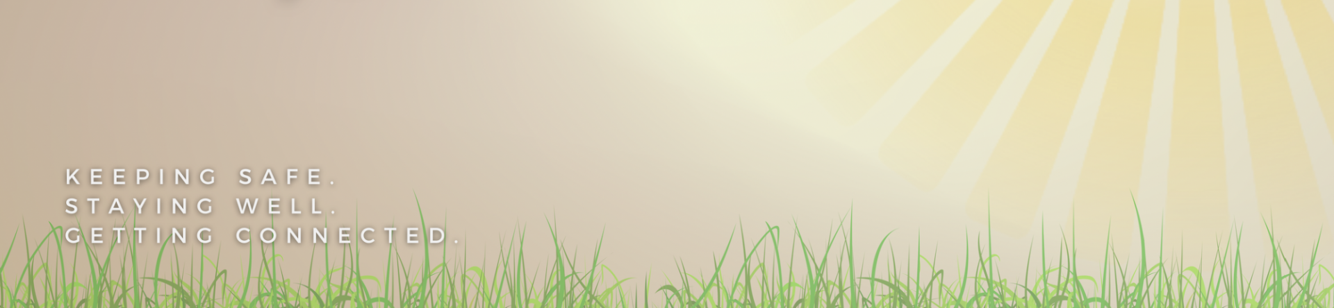 A field of grass with the words "Keeping Safe, Staying Well, Getting Connected".